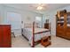 Cozy bedroom features soft lighting, decorative accents, and comfortable bed, creating a calming space at 334 N Shadowbay Blvd, Longwood, FL 32779