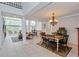 Open-concept dining area flowing into the kitchen and living room at 334 N Shadowbay Blvd, Longwood, FL 32779