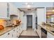 Modern kitchen with granite countertops, stainless steel appliances, and ample storage at 334 N Shadowbay Blvd, Longwood, FL 32779