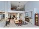 Open living space with a cozy fireplace and clear sight lines throughout at 334 N Shadowbay Blvd, Longwood, FL 32779