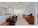 Inviting loft with a comfortable sofa, perfect for relaxing or entertaining guests at 334 N Shadowbay Blvd, Longwood, FL 32779