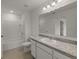 Bathroom features tile floors, a granite countertop, and a shower-tub combination at 3435 Vesara Dr, Davenport, FL 33837