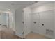 Convenient laundry room featuring tile floors and washer and dryer hookups at 3435 Vesara Dr, Davenport, FL 33837