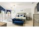 Serene bedroom with stylish decor, including an elegant bed frame, and accent pillows at 3451 Players Point Loop, Apopka, FL 32712