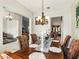 Inviting dining room with a large table, perfect for Gathering gatherings and formal dinners at 3451 Players Point Loop, Apopka, FL 32712
