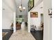 Bright and airy foyer with high ceilings, opening to the living spaces of the home at 3451 Players Point Loop, Apopka, FL 32712