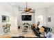 Bright living room with high ceilings, tile flooring, ceiling fan, and plenty of space to relax at 3451 Players Point Loop, Apopka, FL 32712