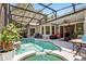 Enjoy the outdoors with a private pool, covered patio, and serene landscaping at 3451 Players Point Loop, Apopka, FL 32712