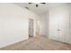 Bedroom with a ceiling fan, and doorways that lead to a bathroom and walk-in closet for convenience at 3925 Green Sabal Dr, Orlando, FL 32824