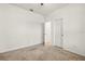 Cozy bedroom featuring carpet flooring, ceiling fan, closet and two doors at 3925 Green Sabal Dr, Orlando, FL 32824