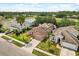 Beautiful home with lush landscaping near a serene lake in a desirable neighborhood at 4249 Andover Cay Blvd, Orlando, FL 32825