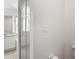 Clean bathroom with a glass-enclosed shower, modern fixtures, and neutral tones at 4249 Andover Cay Blvd, Orlando, FL 32825