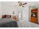 Charming bedroom featuring a ceiling fan, carpeting, and nautical decor at 4249 Andover Cay Blvd, Orlando, FL 32825