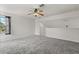 Versatile bonus room with carpeting, a ceiling fan, and ample space for activities at 4249 Andover Cay Blvd, Orlando, FL 32825