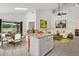 Bright living area featuring neutral decor, and modern kitchen island at 4249 Andover Cay Blvd, Orlando, FL 32825