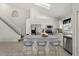 Bright kitchen featuring stainless steel appliances, granite countertops, and an island with bar seating at 4249 Andover Cay Blvd, Orlando, FL 32825