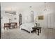 Open-concept living area with tile floors, neutral walls, and a comfortable seating area at 4249 Andover Cay Blvd, Orlando, FL 32825