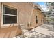 Outdoor patio with chairs, providing a relaxing extension of the indoor living space at 4249 Andover Cay Blvd, Orlando, FL 32825