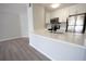 Modern kitchen with white cabinets, stainless steel appliances, and light countertops at 4704 Walden Cir # 21, Orlando, FL 32811