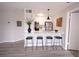 Modern kitchen with stainless steel appliances, breakfast bar with seating and an open concept at 4704 Walden Cir # 21, Orlando, FL 32811