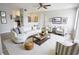 Bright living room features modern furnishings and an open floor plan to the kitchen at 4704 Walden Cir # 21, Orlando, FL 32811
