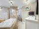 Bright bathroom featuring a soaking tub, vanity and decorative tile work at 5127 Leeward Way, Orlando, FL 32809