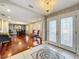 Elegant foyer featuring decorative tile, chandelier, and an archway to the dining area at 5127 Leeward Way, Orlando, FL 32809