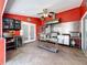 The outdoor kitchen offers stainless steel appliances, ample counter space, and easy access to the outdoor pool area at 5127 Leeward Way, Orlando, FL 32809