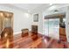 Inviting living room with hardwood floors, connecting to outdoor pool area at 5127 Leeward Way, Orlando, FL 32809