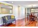 Living room with hardwood floors, elegant furniture, and an arched doorway at 5127 Leeward Way, Orlando, FL 32809
