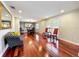 Spacious living room featuring hardwood floors and natural lighting from the large windows at 5127 Leeward Way, Orlando, FL 32809