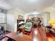 Spacious upstairs living room with rich wood floors and lots of natural light at 5127 Leeward Way, Orlando, FL 32809