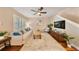 Cozy living room featuring hardwood floors, modern furnishings and a large window at 5262 Baskin St, Orlando, FL 32814