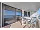 Spacious balcony with ocean view and sliding glass doors at 5275 S Atlantic Ave # 506, New Smyrna Beach, FL 32169