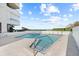 Exterior shot of the community pool and surrounding deck at 5275 S Atlantic Ave # 506, New Smyrna Beach, FL 32169