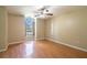 Inviting bedroom with vaulted ceiling, light-colored walls, and beautiful floors offers a comfortable retreat at 554 Appleton Pl, Oviedo, FL 32765