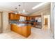 Bright kitchen showcases stainless appliances, granite countertops, and modern lighting at 554 Appleton Pl, Oviedo, FL 32765
