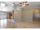 Spacious living area showcasing ceramic tile flooring, and an open layout at 554 Appleton Pl, Oviedo, FL 32765