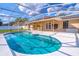 Inviting in-ground pool and screened enclosure create a private backyard oasis at 554 Appleton Pl, Oviedo, FL 32765