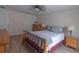 Bedroom with natural light, ceiling fan, and wood-look laminate flooring throughout at 5547 Garden Grove Cir, Winter Park, FL 32792