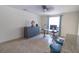 Well-lit home office with modern furniture and tile flooring at 5547 Garden Grove Cir, Winter Park, FL 32792