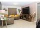 Basement living area with large TV and comfortable seating arrangements at 5897 Soter Ln, Windermere, FL 34786