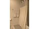 Bathroom featuring a white shower curtain and a towel rack at 5897 Soter Ln, Windermere, FL 34786