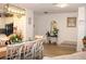 Bright dining area with charming decor, comfortable seating, and access to the living spaces at 5897 Soter Ln, Windermere, FL 34786