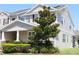 Beautiful two-story home with well-manicured landscaping and charming architecture creating a welcoming curb appeal at 5897 Soter Ln, Windermere, FL 34786