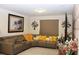 Inviting living room with neutral décor, comfortable seating, and recessed lighting for a modern touch at 5897 Soter Ln, Windermere, FL 34786
