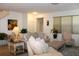 Cozy living room with comfortable seating, plants, and natural light at 5897 Soter Ln, Windermere, FL 34786