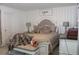 Comfortable main bedroom featuring a king bed and elegant furnishings at 5897 Soter Ln, Windermere, FL 34786