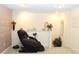 Relaxing sitting area with comfortable massage chair and soft carpeting, great for unwinding after a long day at 5897 Soter Ln, Windermere, FL 34786