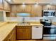 Efficient kitchen with stainless steel appliances and ample counter space at 650 Woodridge Drive, Fern Park, FL 32730